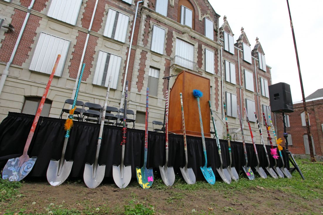 Shovels lined up ready to break ground.